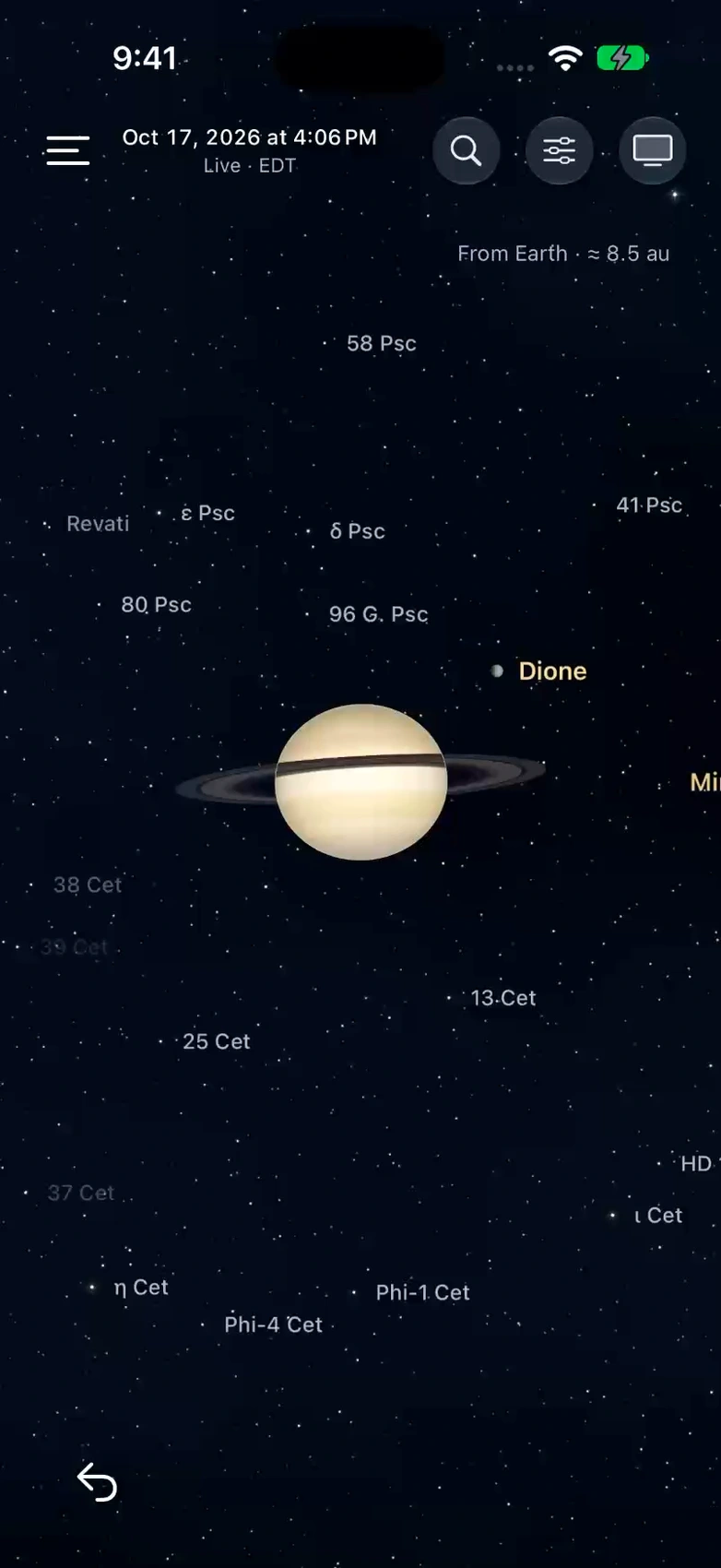 Actual iPhone Globe view of Saturn and its moons, with native navigation controls.